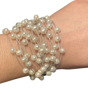 Faux pearl on silver tone beading thread/wire bracelet